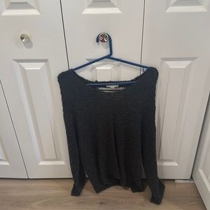 Greenish/gray sweater with open back
